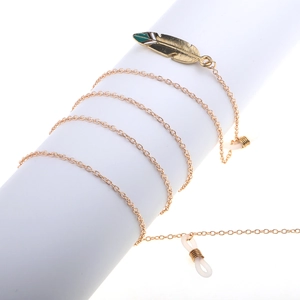 Golden metal eyewear chain featuring a feather pendant with green enamel and anti-slip loops