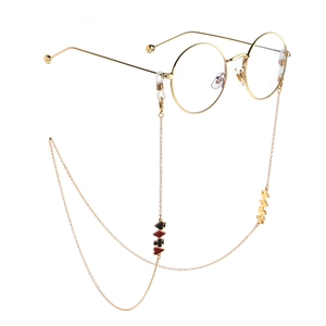 Golden round frame glasses with a decorative non-slip poker pendant chain accessory