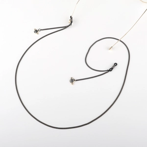 Chaîne de lunettes noire en métal avec pendentifs planète sur monture dorée