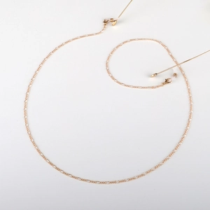 Elegante catenella per occhiali Figaro dorata con fermagli a moschettone e asole