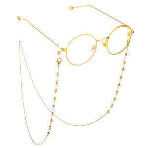 Chaîne de lunettes dorée avec perles blanches et perles en métal sur monture ronde
