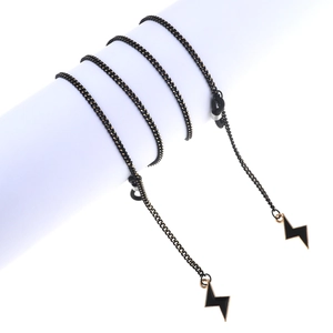 Chic black metal eyewear chain featuring minimalist gold-edged lightning bolt pendants