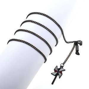 Fashionable black metal eyewear chain with a stylish tricolor windmill pendant accessory