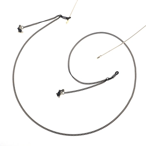 Chic black metal eyewear chain featuring gold-edged rabbit charms with crystals