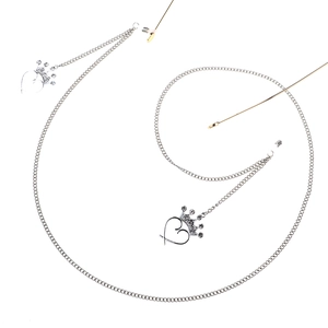 Silver eyewear chain featuring heart crown pendants with white rhinestones