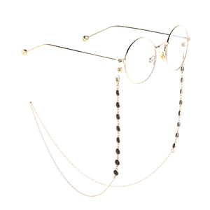 Retro golden round frame glasses with a matching black beaded decorative hanging chain