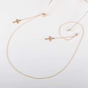 Chaîne à lunettes en métal doré avec pendentifs croix en strass et boucles silicone