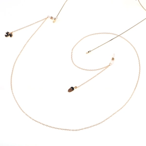 Golden metal non-slip eyewear chain with cute squirrel and acorn charms on white background