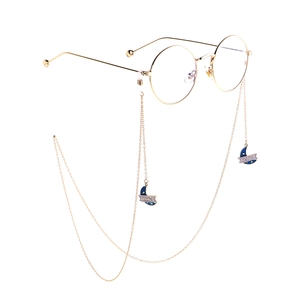 Lunettes rondes dorées avec chaîne antidérapante et pendentifs lune bleue Space