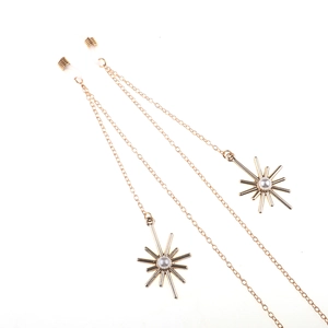 Golden eyewear chain with anti-slip loops and pearl snowflake pendant on white background