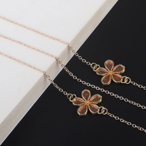 Chaîne De Lunettes Élégante En Cuivre Doré Cordon Antidérapant Avec Pendentif Fleur En Résine De Cristal Pour Femmes
