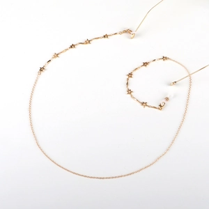 Handmade gold star eyewear chain with metal star charms and silicone loops for glasses