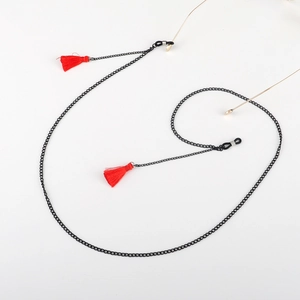 Handmade black metal glasses chain featuring vibrant red tassels and rubber grips