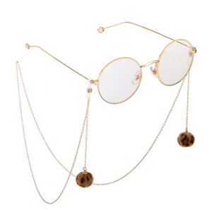 Cadena de gafas en metal dorado con pompones de leopardo y montura de estilo retro