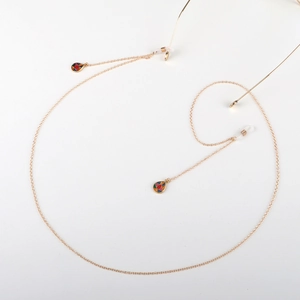 Golden eyewear chain with colorful droplet pendants and silicone non-slip rubber ends