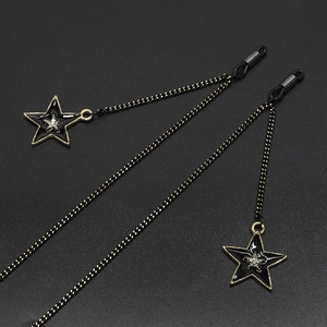 Black star pendant eyewear chain with crystals and gold finish nonslip silicone loops