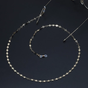 Chaîne de lunettes dorée faite à la main avec petites étoiles et boucles silicone