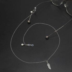 Silver metallic eyewear chain with vintage feather charms, pearls, and non-slip loops