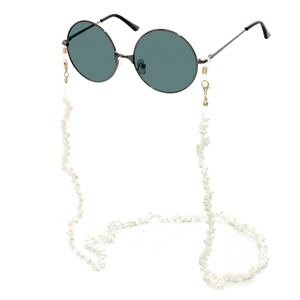 White shell eyewear chain with round green sunglasses on minimalist white background