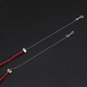 Ethnic eyeglass chain with red and green striped ribbon and silver metal links