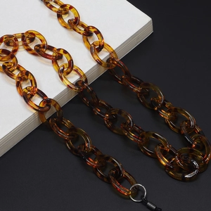 Tortoiseshell resin eyewear chain with amber acrylic links and non-slip rubber loops