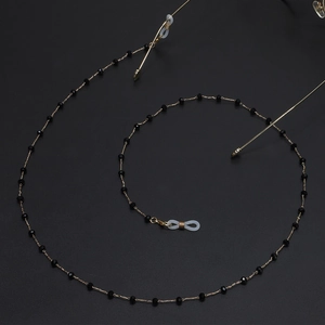 Elegant gold metal eyeglasses chain with black crystal beads and non-slip rubber loops