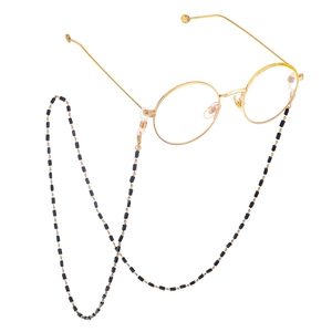 Chaîne à lunettes en cristal noir fait main avec métal doré et boucles en silicone