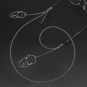 Chaîne à lunettes dorée avec pendentifs visage abstrait et boucles antidérapantes