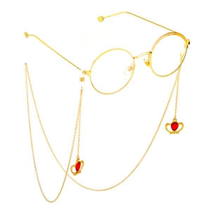 Chaîne de lunettes dorée avec pendentifs en forme de couronne et cristaux rouges
