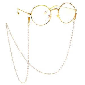 Elegant gold round glasses with a minimalist pearl chain accessory on a white background