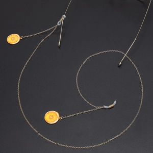 Golden metal glasses chain with realistic orange slice charms and non-slip loops