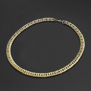 Chunky gold-tone Cuban link necklace with textured finish and lobster clasp closure