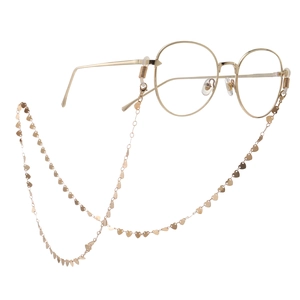 Gold round metal frame glasses with matching heart-shaped anti-slip chain accessory