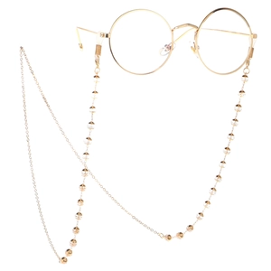 Chaîne de lunettes dorée élégante avec perles transparentes et monture ronde