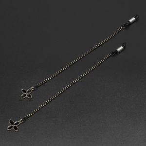 Multifunctional black braided glasses chain with gold accents and four-petal flower pendant