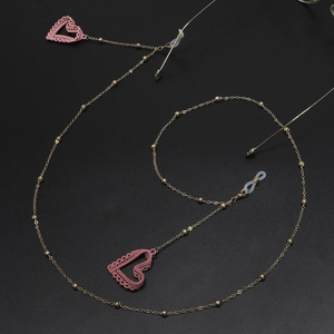 Chaîne à lunettes dorée ornée de cœurs en dentelle rose et de petites perles dorées