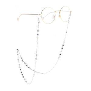Lunettes rondes dorées élégantes avec une chaîne en métal faite main ornée d'étoiles