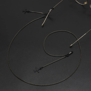 Minimalist black metal eyewear chain with airplane pendant charm and anti-slip rubber loops