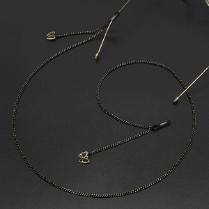 Elegante catenella per occhiali intrecciata nero e oro con pendenti a farfalla