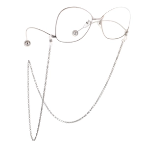 Close-up of silver circular chain links on modern minimalist sun glasses frame