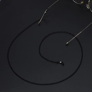Matte black metal sunglasses chain with anti-slip rubber loops and fine circular links