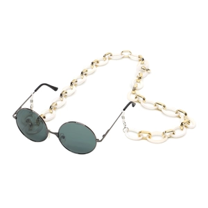 Lunettes de soleil rondes rétro avec chaîne épaisse en résine blanche et métal doré