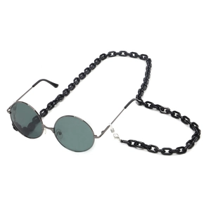 Retro round metal sunglasses with a thick black acrylic link chain on a white background