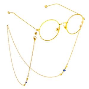 Detail of 70cm gold glasses chain with blue glass beads and anti-slip rubber loops