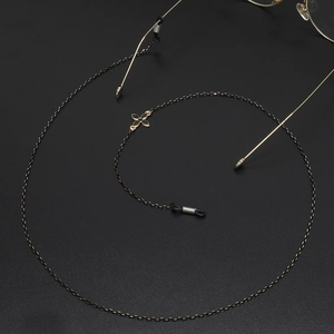 Black metal eyeglass chain with gold clover charms and anti-slip silicone loops