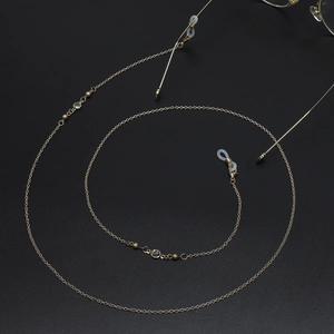 Detail of 70cm gold metal glasses chain with glass beads and silicone connectors