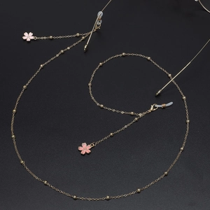 Chaîne de lunettes en métal doré élégante avec fleurs de cerisier roses et boucles
