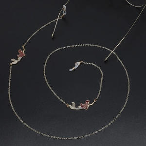 Chic golden mermaid glasses chain with rhinestone accents and anti-slip silicone loops
