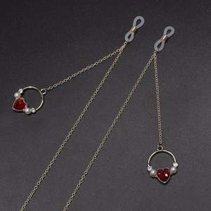 Gold glasses chain featuring red heart crystals, white pearls and anti-slip rubber loops