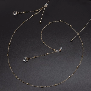 Fashionable gold beaded eyeglass chain with elegant transparent crystal pendant
